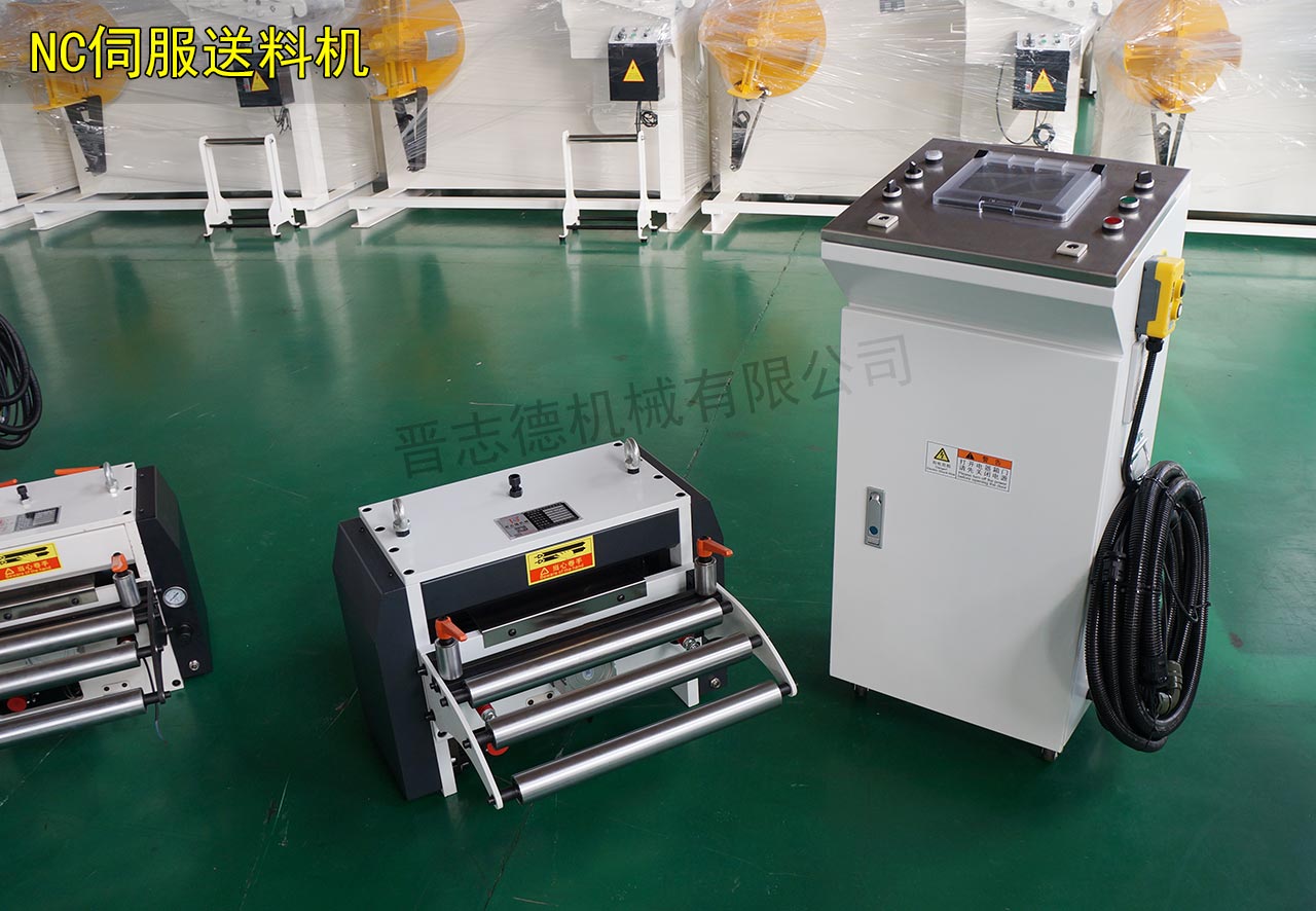 英國NC伺服送料機(jī) 英國NC伺服送料機(jī)